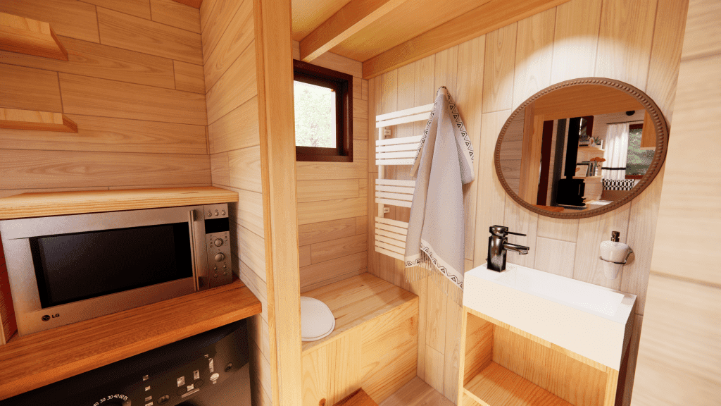 tiny house toit bipente la Lucette avec salle de bain avec douche, toilettes sèches, sèche-serviettes et vasque sur meuble de rangement